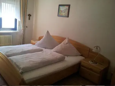 Ein Bett oder Betten in einem Zimmer der Unterkunft Ferienwohnung 