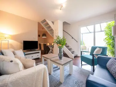 Ein Sitzbereich in der Unterkunft Family home in Hambachtal Boutique Resort