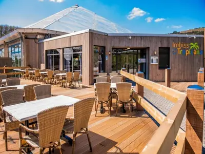 Ein Restaurant oder anderes Speiselokal in der Unterkunft Holiday home in Hambachtal Boutique Resort
