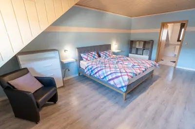 Ein Bett oder Betten in einem Zimmer der Unterkunft Gästehaus Franzmann