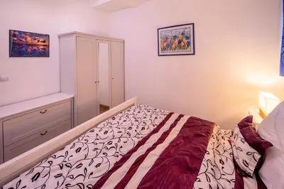 Ein Bett oder Betten in einem Zimmer der Unterkunft Ferienwohnung Vulkaneifel