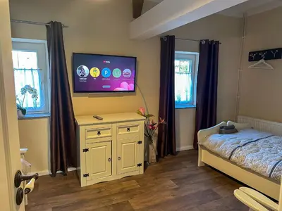 Ein Bett oder Betten in einem Zimmer der Unterkunft Ferienhaus Sonnentälchen Weinberg