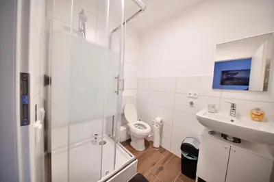 Ein Badezimmer in der Unterkunft Koblenz City Center Apartments