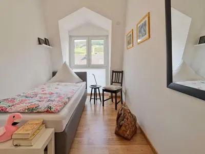 Ein Bett oder Betten in einem Zimmer der Unterkunft Alte Druckerei