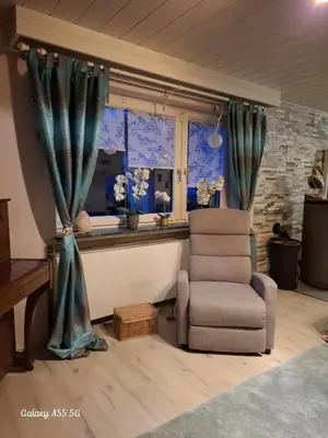 Ein Sitzbereich in der Unterkunft Ferienwohnung Seeblick