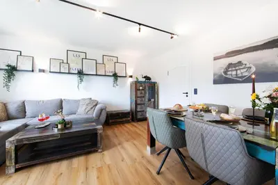 Ein Sitzbereich in der Unterkunft Burgberg City Apartment