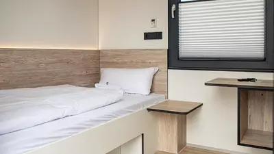 Ein Bett oder Betten in einem Zimmer der Unterkunft Roatel Waldlaubersheim A61 my-roatel-com