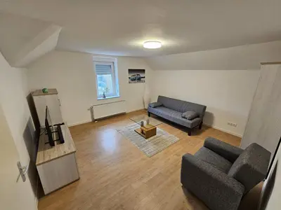 Ein Sitzbereich in der Unterkunft Ferienwohnung Zur Lore