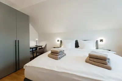 Ein Bett oder Betten in einem Zimmer der Unterkunft Ferienhaus HeimatLay