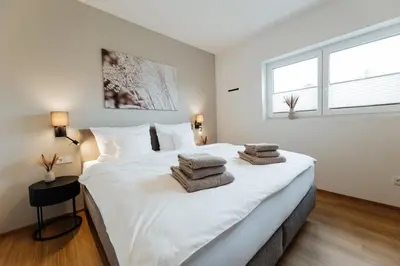 Ein Bett oder Betten in einem Zimmer der Unterkunft Ferienhaus HeimatLay
