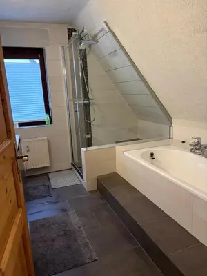 Ein Badezimmer in der Unterkunft NringRooms RingQuartier