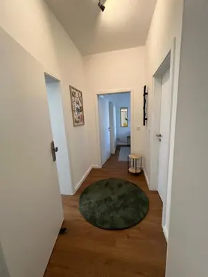 Ein Bett oder Betten in einem Zimmer der Unterkunft Ferienwohnung in Andernach - Insula Antunnacum