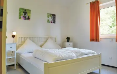 Ein Bett oder Betten in einem Zimmer der Unterkunft Lovely Home In Gerolsteinhinterhausen