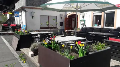 Ein Restaurant oder anderes Speiselokal in der Unterkunft Pension Rodenburg