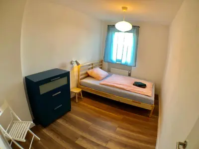Ein Bett oder Betten in einem Zimmer der Unterkunft Auszeit-Eifel Appartements