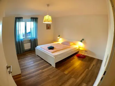 Ein Bett oder Betten in einem Zimmer der Unterkunft Auszeit-Eifel Appartements