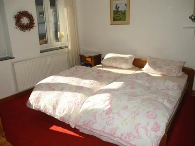 Ein Bett oder Betten in einem Zimmer der Unterkunft Villa Luzia