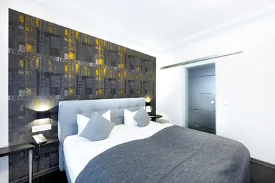 Ein Bett oder Betten in einem Zimmer der Unterkunft Hochwald Lodge