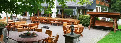 Ein Restaurant oder anderes Speiselokal in der Unterkunft Baunhöller-Mühle