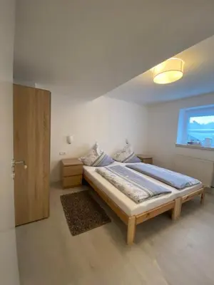 Ein Bett oder Betten in einem Zimmer der Unterkunft Privatzimmer Hoffmann