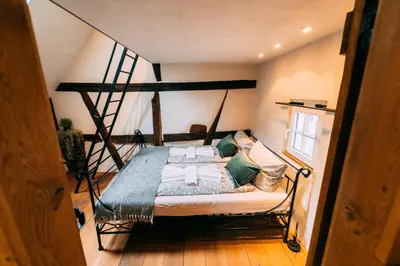 Ein Bett oder Betten in einem Zimmer der Unterkunft Haus zum Ring