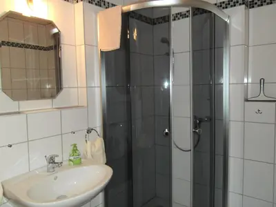 Ein Badezimmer in der Unterkunft Weingut u. Gästehaus Menten