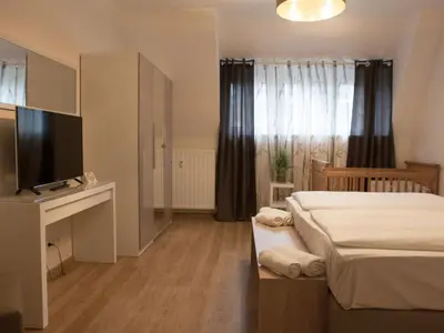 Ein Bett oder Betten in einem Zimmer der Unterkunft Hotel Ravene