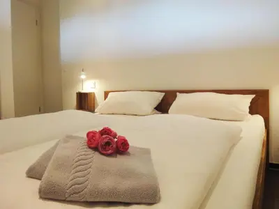Ein Bett oder Betten in einem Zimmer der Unterkunft Ferienwohnung am Moselufer