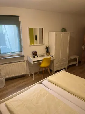 Ein Bett oder Betten in einem Zimmer der Unterkunft Der Stammbaum ORIGIN STAY