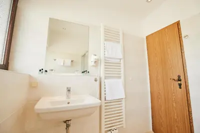 Ein Badezimmer in der Unterkunft Hotel Parc Fermé am Nürburgring