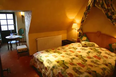 Ein Bett oder Betten in einem Zimmer der Unterkunft Hotel Burg Arras