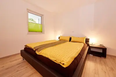 Ein Bett oder Betten in einem Zimmer der Unterkunft Alte Brauerei Wohnung 4