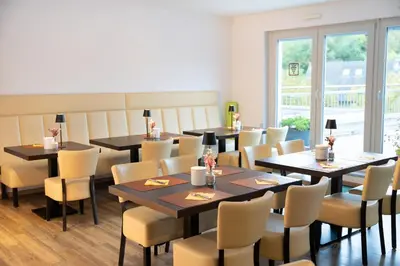 Ein Sitzbereich in der Unterkunft Alembra - Wein Style Hotel