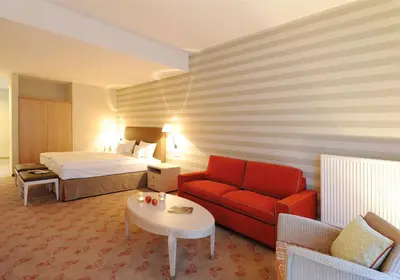 Ein Bett oder Betten in einem Zimmer der Unterkunft Landhotel Sanct Peter