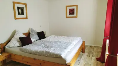 Ein Bett oder Betten in einem Zimmer der Unterkunft Ferienwohnung am Nürburgring 2.OG
