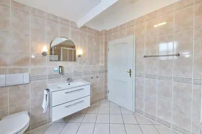 Ein Badezimmer in der Unterkunft Hotel Sankt Maximilian 