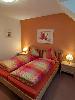 Ein Bett oder Betten in einem Zimmer der Unterkunft Zenners Landhotel