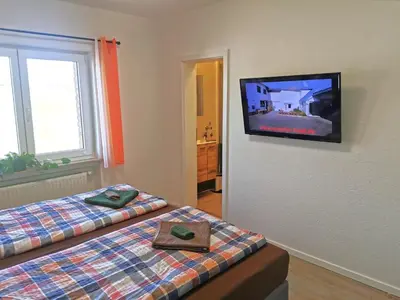 Ein Bett oder Betten in einem Zimmer der Unterkunft Speedys Bed & Breakfast
