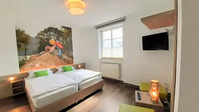 Ein Bett oder Betten in einem Zimmer der Unterkunft Winkelwerkstatt Hotel