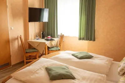 Ein Bett oder Betten in einem Zimmer der Unterkunft Perle am Rhein