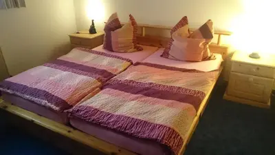 Ein Bett oder Betten in einem Zimmer der Unterkunft Ferienwohnung An der Loreley