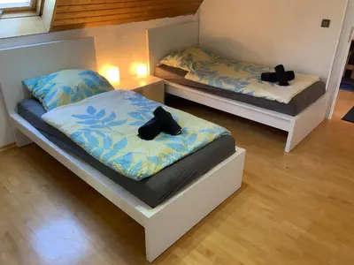 Ein Bett oder Betten in einem Zimmer der Unterkunft KRIO Nicola Rothfuchs Ferienwohnung 2
