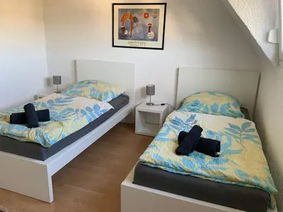 Ein Bett oder Betten in einem Zimmer der Unterkunft KRIO Nicola Rothfuchs Ferienwohnung 2