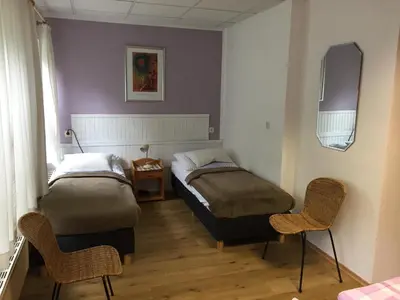 Ein Bett oder Betten in einem Zimmer der Unterkunft Ferienhaus Waldrand