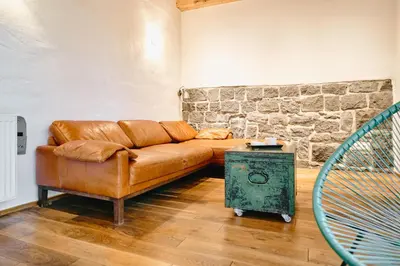 Ein Sitzbereich in der Unterkunft Basalt-Loft