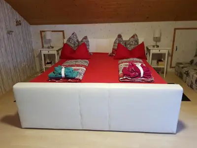 Ein Bett oder Betten in einem Zimmer der Unterkunft Ferienwohnung Schäfer