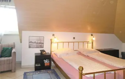 Ein Bett oder Betten in einem Zimmer der Unterkunft Beautiful Apartment In Lissendorf