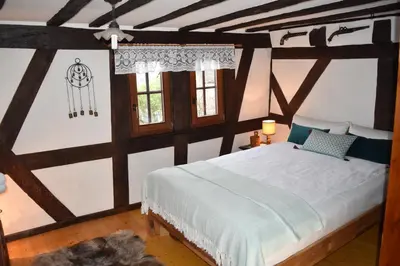 Ein Bett oder Betten in einem Zimmer der Unterkunft Das Pautzen Haus