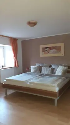 Ein Bett oder Betten in einem Zimmer der Unterkunft Ferienhaus Feinen