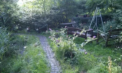 Ein Garten an der Unterkunft Ferienwohnungen Willrich - Ferienwohnung 3